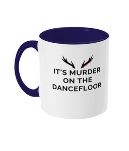 Mug with a navy blue handle and navy blue inner that reads "It's Murder On The Dancefloor" with antlers above the text with blood drips coming from the right bottom antler