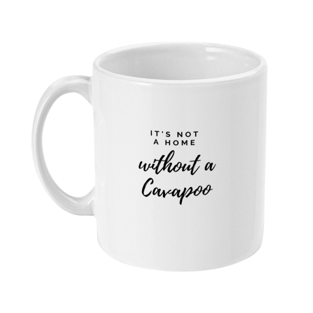 Mug with text on that says: It's not a home without a cavapoo