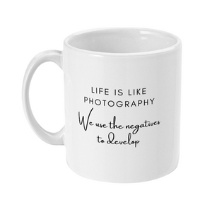 Mug with text that says: Life is like photography. We use the negatives to develop