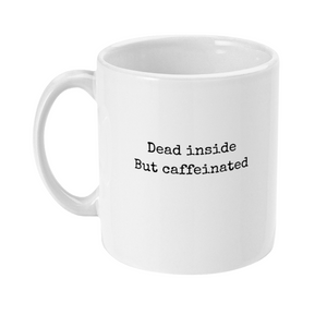 Mug with text on in a typewriter style font that says: dead inside but caffeinated
