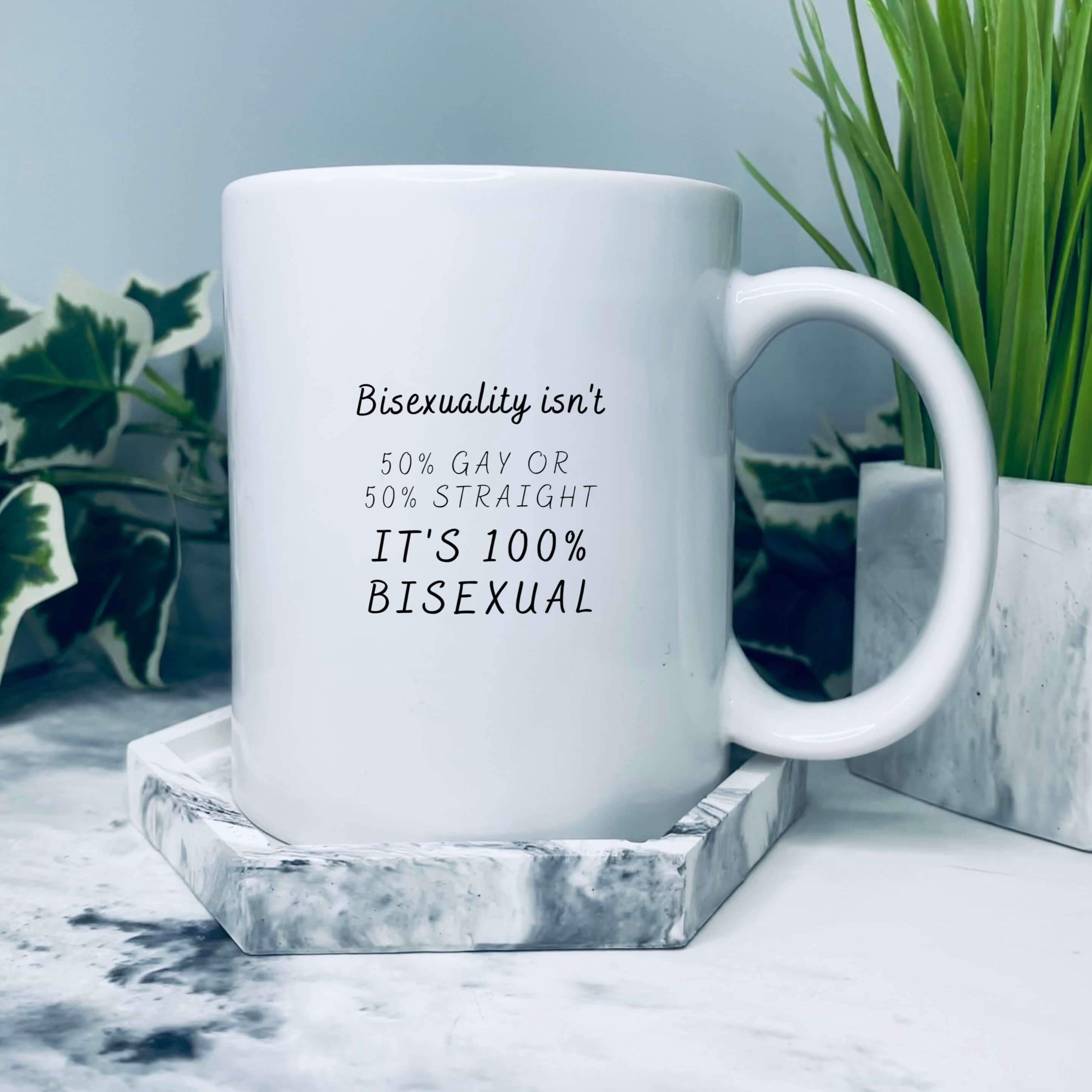 Mug that reads: Bisexuality isn’t 50% gay or 50% straight, it’s 100% bisexual mug. 
