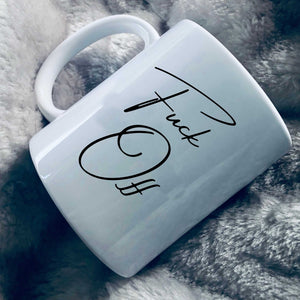 Mug with handwriting style text that says: Fuck Off