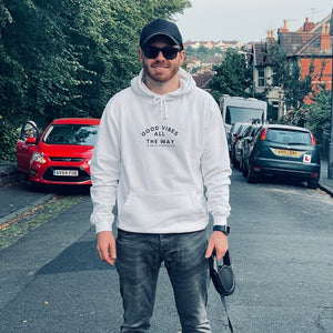 Arctic white hoodie with text that reads: Good Vibes All The Way. The Positive Affirmation Club in the middle of the chest. Text is in black writing 