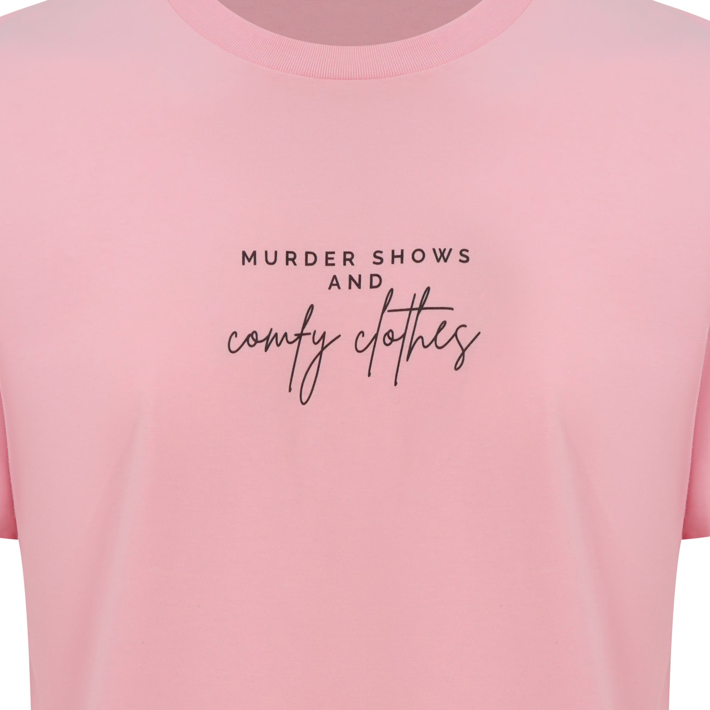 Organic T-Shirt that says: Murder shows and comfy clothes. Murder shows is in all caps in a serif font, and comfy clothes is in a handwriting style font