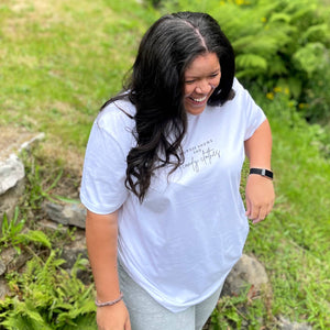 White Organic T-Shirt that says: Murder shows and comfy clothes. Murder shows is in all caps in a serif font, and comfy clothes is in a handwriting style font 