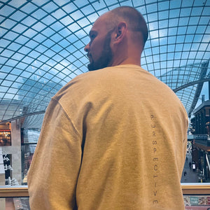 Sweatshirt with "perspective" down the back of the jumper. Letters in the word of perspective are tilted to give perspective to the word perspective