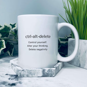 Mug reads: Control yourself. Alter your thinking. Delete negativity