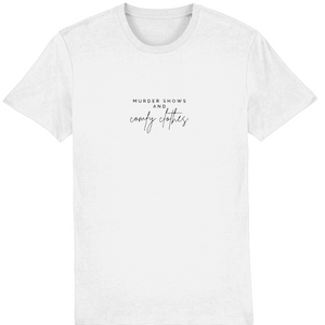 White Organic T-Shirt that says: Murder shows and comfy clothes. Murder shows is in all caps in a serif font, and comfy clothes is in a handwriting style font 