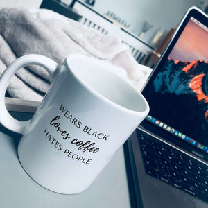 Mug that says: wears black, loves coffee, hates people