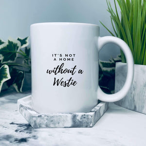 Mug that reads: It's not a home without a westie